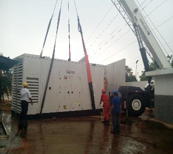 Generator suspended with slings during lifting