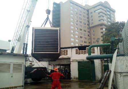 Generator suspended in front of the Crowne Plaza Maruma Hotel